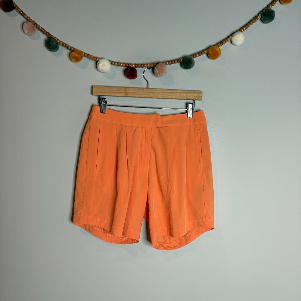 NWT Nike Women's Flex Ace Dri Fit Peach Standard Fit Pleated Golf 7" Shorts